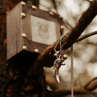 Collier de loup \"Ne jamais abandonner\"